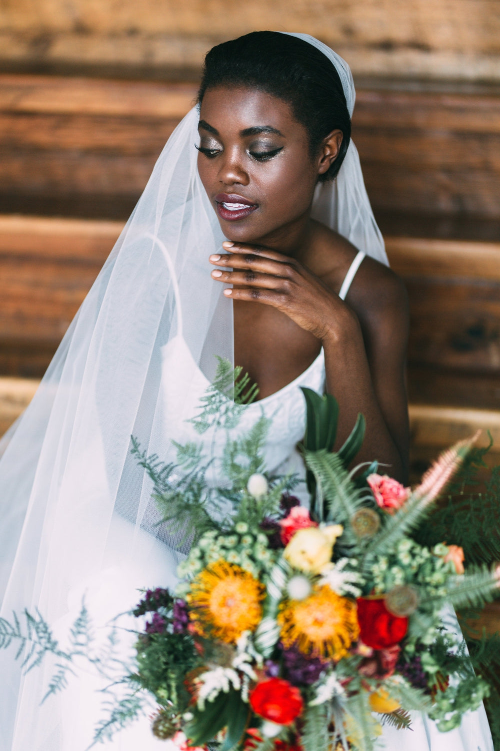 https://www.blairnadeau.com/cdn/shop/products/simple_modern_tulle_juliet_veil_vintage_inspired_bridal_veil_juliet_wedding_veil_ivory_bridal_veil_white_wedding_veil_handmade_in_Toronto_Canada_Blair_Nadeau_Millinery_-_Young_Glass_Photography_4.jpg?v=1684976701&width=2048